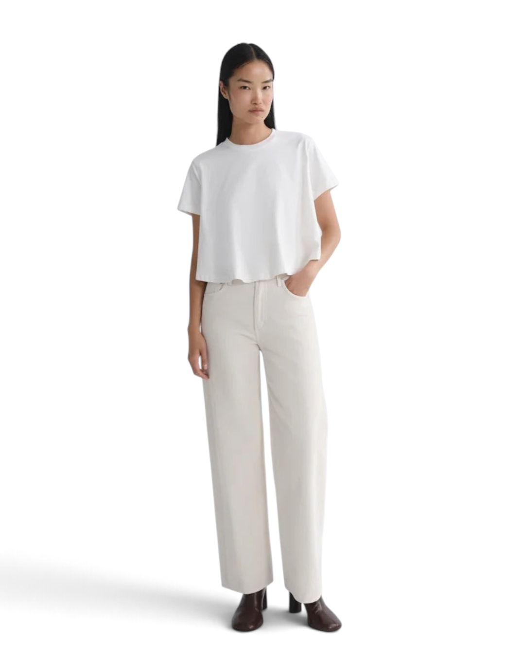 Model wearing Jack Jerome AGOLDE Ren high-rise wide-leg bone corduroy jeans with a white cropped t-shirt